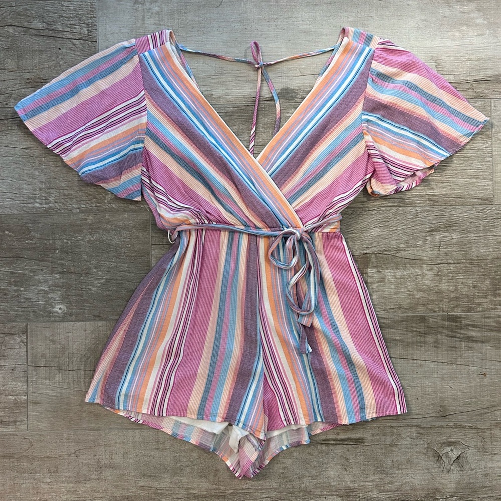 Cute multi colored romper from Francesca’s size M
